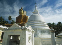 Giant seated Buddha constructed in 1970 with stupa in foreground.Vihara meaning  image house