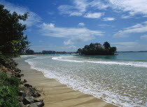 Also called Yakinige Duwa or Count de Maunys Island.  Shoreline and small islet with house amongst trees.