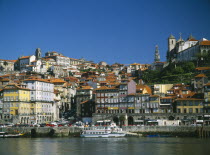 City view from the River Douro toward the Ribeira District with Clerigos Tower in the distancePorto