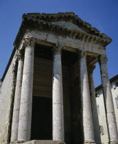 Columned facade of the Temple of Romae and Augustus which stands on the site of the former Roman ForumPola