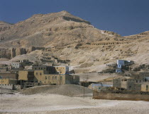 The Ramesseum. View of  Tombs of the nobles in hillside opposite the Ramesseum.