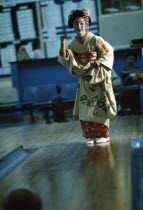 Geisha in bowling alley