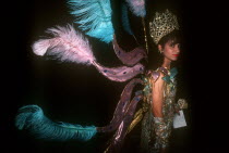 Contestant in Miss Puerto Rico beauty contest wearing exotic costume.