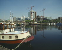 Docklands waterfront building development  moored boats