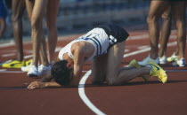Exhausted Athlete on his hands and knees