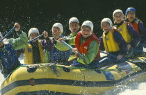 Group of people white water rafting in  Austria