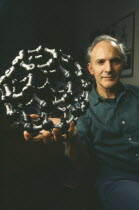 Professor Harry Kroto holding molymod