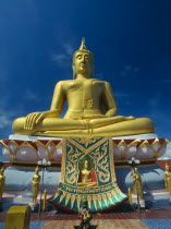 Big Buddha Beach. Seated golden Big Buddha statue