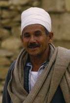 Smiling guide wearing white turban