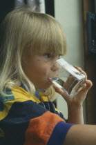 Girl drinking a glass of water