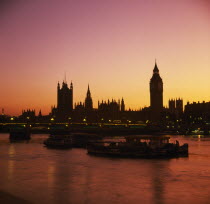 Houses of Parliament & Big Ben at sunset; orange sky.