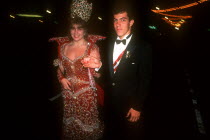 Couple in evening dress at Miss Puerto Rico beauty contest.