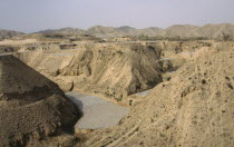 Loess scenery near the Yellow River showing farming under polythene tunnelsTunnel PolytunnelsTunnel Polytunnels