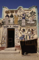 House on West Bank of the Nile decorated with both Muslim figures and hieroglyphics