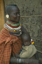 Anna Naguie with her baby in Kalobeyei camp for destitute Turkana.