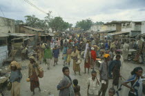 Crowded street market scene.