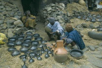 Black pottery for sale at market. Gonder