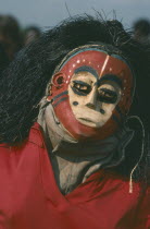 Masked dancer at Gunga festival.