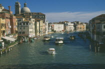 View over the Grand Canal and water traffic from the Ponte degli Scalzi.