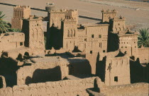 Elevated view over kasbah used in films including Lawrence of Arabia and Jesus of Nazareth with storks nesting on fortified tower.UNESCO World Heritage site