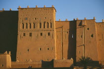 Kasbah Taorirt .  Nineteenth century kasbah of the el-Glaoui dynasty.  Exterior walls partly in deep shadow.