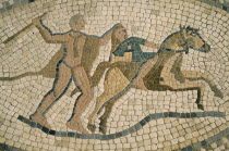 Detail of mosaic depicting horseman and figure with club.