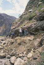 Workers clearing a land slide.