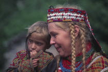 European anthropologist with Kalash boy.