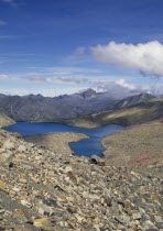 Laguna Grande de la Sierra  Sierra Nevada de Cocuy  A large lagoon surrounded by mountains.