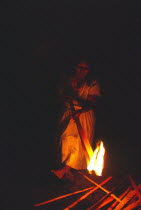 Tukano Indian woman lighting a fire. Vuapes