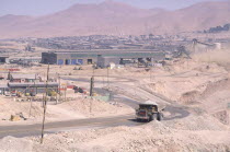 A truck leaving the Copper Mine  the road leading away from the industrial landscape.