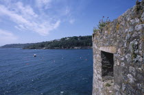 St Peter Port. Castle Cornet with part view of wall and sea.