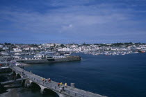 St Peter Port. View from Castle Cornet towards marina and quayside buildings.