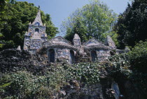 St Andrews. Les Vauxbelets.The Little Chapel surrounded by trees.Modelled on the Shrine at Lourdes. Made from china pottery and fragments of sea shells. Asia Chinese Chungkuo European Jhongguo Northe...
