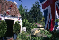 Forest Parish. German Occupation Museum. Main entrance with Union Jack flag flying in forground.