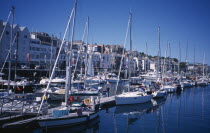 St Peter Port. Victoria Marina yachts and quayside buildings.