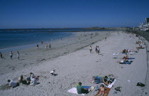 Castel. Cobo Bay. Sandy beach with sunbathers Beaches Resort Sandy Seaside Shore Tourism