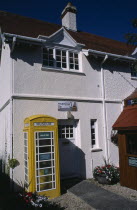 Castel. Telephone museum. Traditional yellow phone box
