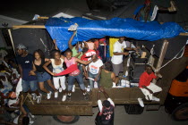 Mobile sound system and dancers on a truck at Easterval Easter Carnival procession around the island