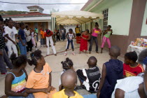 Children watching other children dancing to a sound system at the Easterval Easter Carnival in Clifton