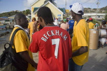 Men of the Baptist congregation in Clifton at Easter morning harbourside service for those lost at sea with one wearing a Beckham football shirt