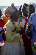Woman amongst the Baptist congregation in Clifton at Easter morning harbourside service for those lost at sea
