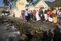 Baptist preacher and congregation in Clifton at Easter morning harbourside service for those lost at sea