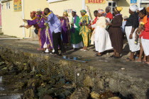 Baptist preacher and congregation in Clifton at Easter morning harbourside service for those lost at sea