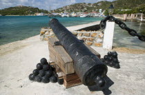 Ancient canon on the harbourside at Clifton with the town and mooring behind