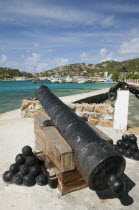 Ancient canon on the harbourside at Clifton with the town and mooring behind