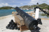 Ancient canon on the harbourside at Clifton with the town and moorings in the distance
