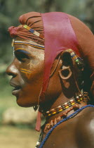 Portrait of Samburu warrior wearing ochre body paint.