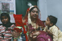 Hindu bride with children.