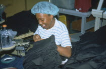 Free zone worker in garment factory.